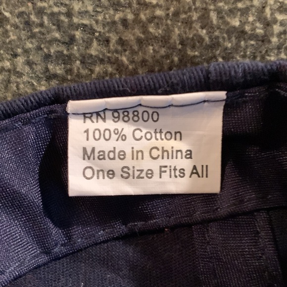 Navy hat w/ red embroidered USA.  Velcro strap in back. One size fits all - Picture 2 of 7